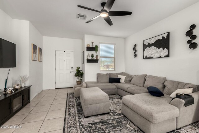 40467 W Jenna Ln, Maricopa, AZ 85138 - living area with visible vents, light tile patterned flooring, and a ceiling fan