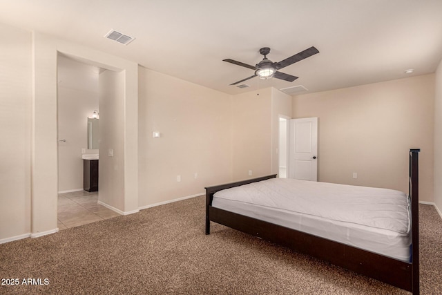 unfurnished bedroom with ceiling fan and light colored carpet