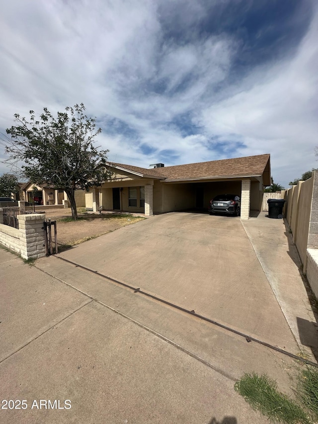 1045 S Solomon St, Mesa, AZ 85204 - ranch-style house featuring driveway and brick siding