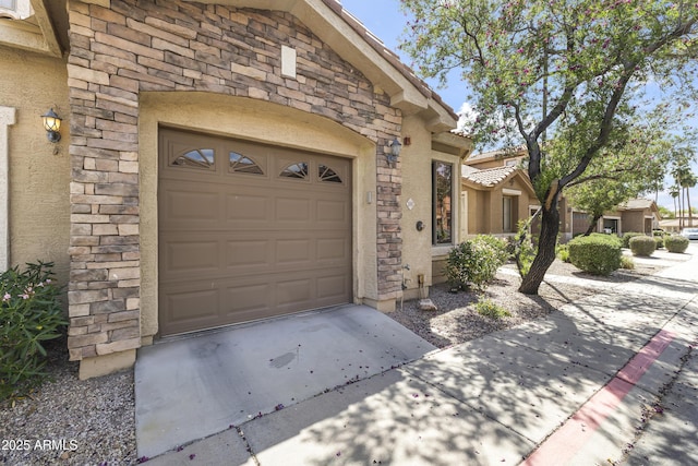 exterior space with concrete driveway
