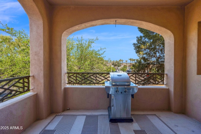 exterior space with area for grilling and a balcony