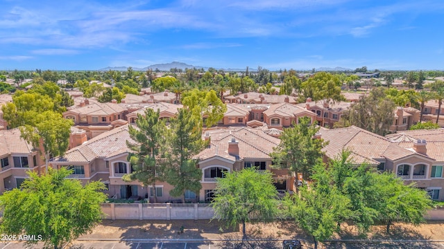 drone / aerial view featuring a mountain view and a residential view