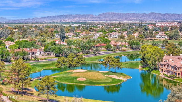 bird's eye view with a residential view, view of golf course, and a water and mountain view