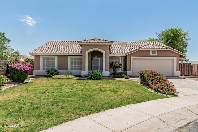 3059 E Tyson Ct, Gilbert, AZ 85295 - mediterranean / spanish-style house with stucco siding, a garage, concrete driveway, and a tile roof