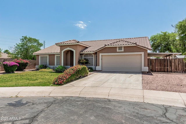 3059 E Tyson Ct, Gilbert, AZ 85295 - mediterranean / spanish-style house featuring a tile roof, stucco siding, an attached garage, and driveway