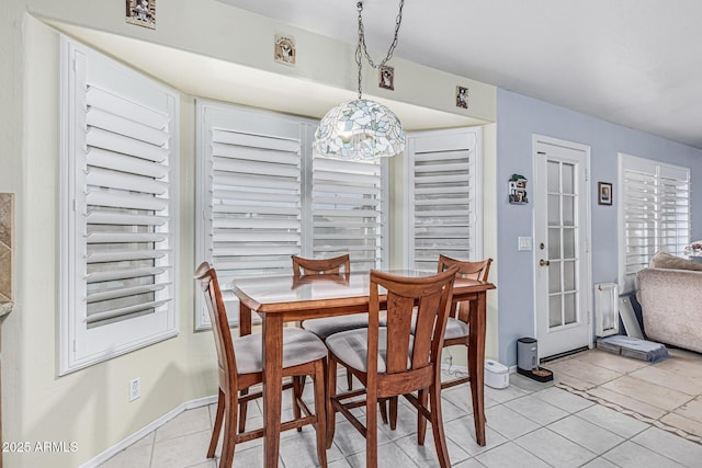 3059 E Tyson Ct, Gilbert, AZ 85295 - dining space with light tile patterned flooring and baseboards