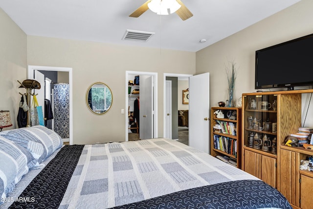110 E Saddle Way, San Tan Valley, AZ 85143 - bedroom featuring a walk in closet, ensuite bath, and ceiling fan