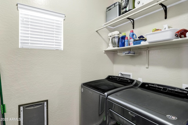 110 E Saddle Way, San Tan Valley, AZ 85143 - laundry room featuring washing machine and clothes dryer and a textured wall