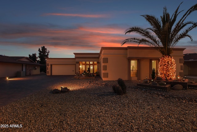 view of front of property featuring a garage