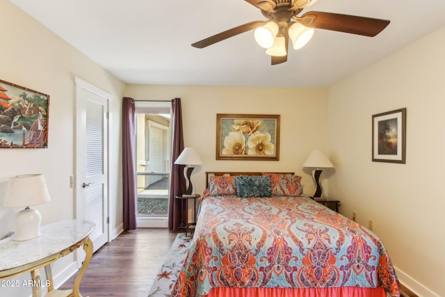 bedroom featuring hardwood / wood-style floors, a closet, and ceiling fan