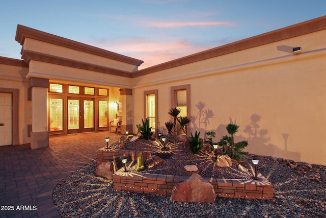 view of patio terrace at dusk