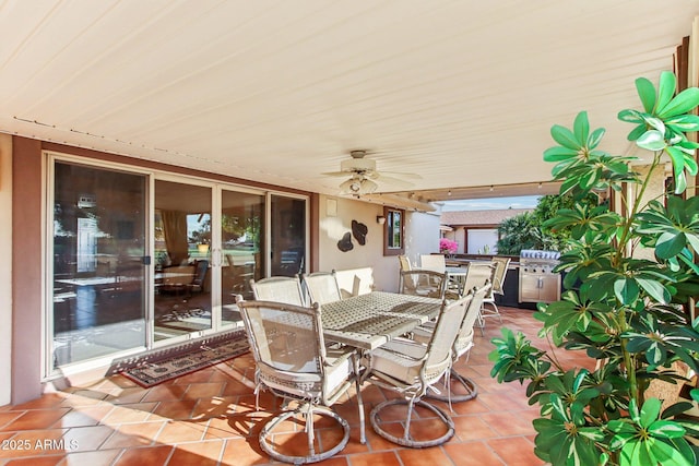 view of patio featuring ceiling fan