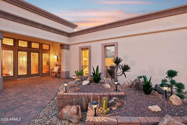 view of patio terrace at dusk