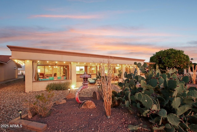 view of yard at dusk