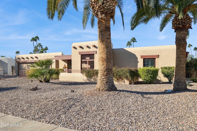 view of pueblo revival-style home