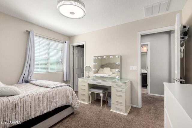 bedroom featuring baseboards, visible vents, and carpet floors