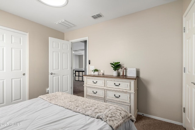 bedroom with carpet, visible vents, and baseboards