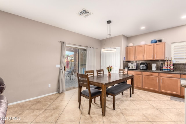 view of tiled dining space