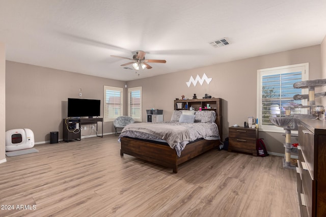 bedroom featuring ceiling fan and light wood-type flooring