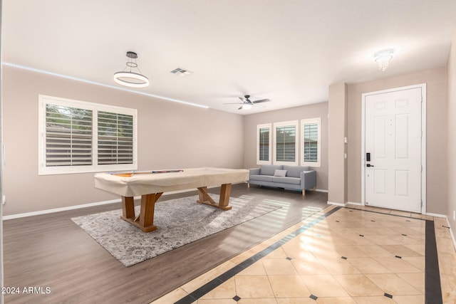 rec room with ceiling fan, wood-type flooring, and billiards