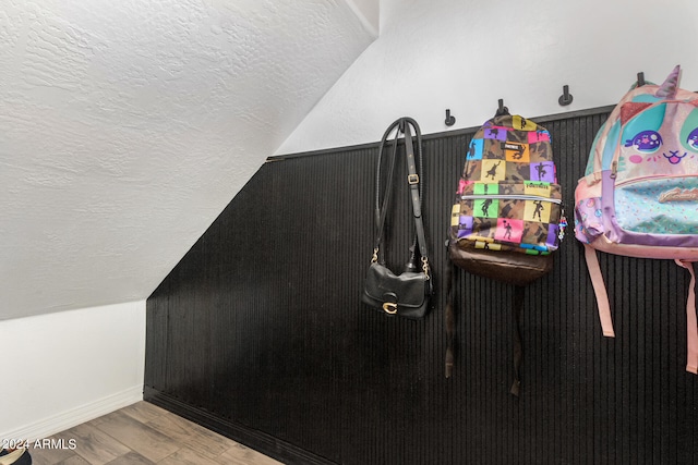 details featuring wood-type flooring and a textured ceiling