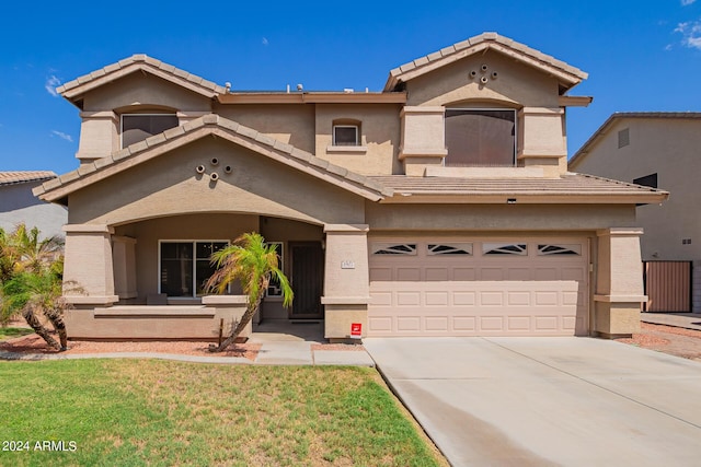 view of front of property with a garage