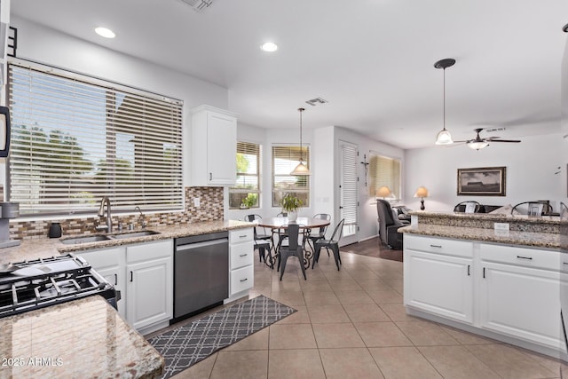 1405 E Aloe Dr, Chandler, AZ 85286 - kitchen featuring dishwasher, a sink, backsplash, white cabinets, and light tile patterned floors
