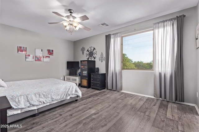 1405 E Aloe Dr, Chandler, AZ 85286 - bedroom with wood finished floors, baseboards, and ceiling fan
