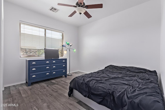 1405 E Aloe Dr, Chandler, AZ 85286 - bedroom featuring dark wood-style flooring, baseboards, and ceiling fan