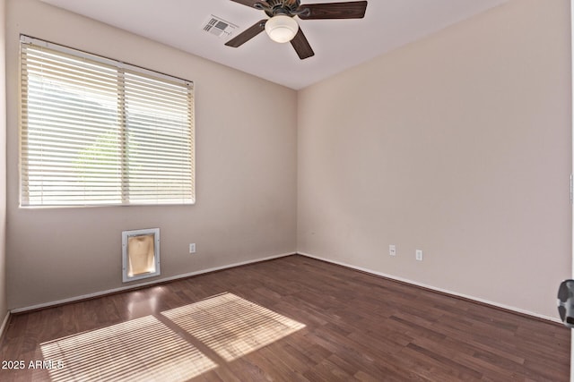 1405 E Aloe Dr, Chandler, AZ 85286 - unfurnished room with a ceiling fan, wood finished floors, and baseboards