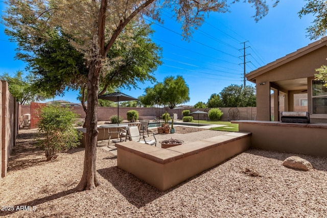 1405 E Aloe Dr, Chandler, AZ 85286 - fenced backyard with a patio