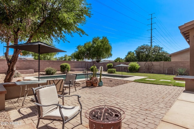 1405 E Aloe Dr, Chandler, AZ 85286 - fenced backyard with a fire pit and a patio
