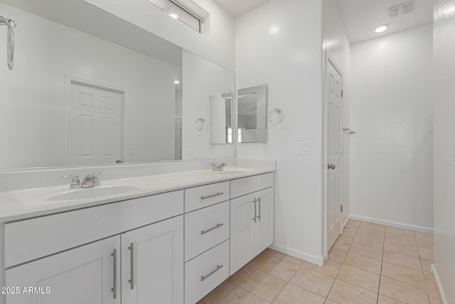 bathroom featuring vanity and tile patterned floors