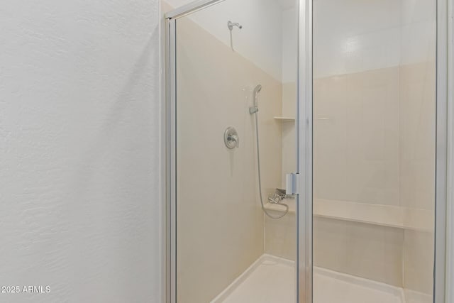 bathroom featuring an enclosed shower