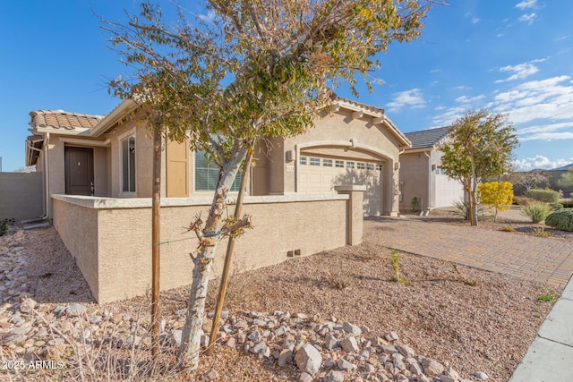 view of front of home featuring a garage