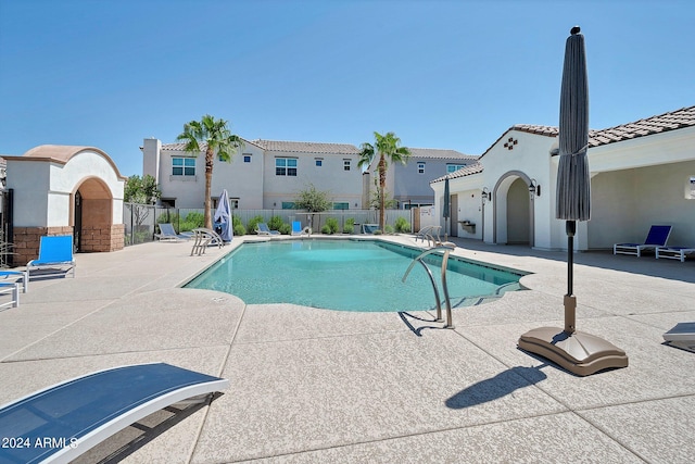 view of pool featuring a patio