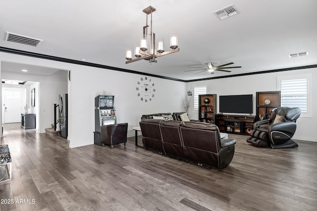 5223 S Axiom, Mesa, AZ 85212 - living room featuring ceiling fan, wood finished floors, a chandelier, crown molding, and baseboards