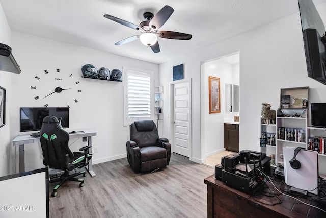 5223 S Axiom, Mesa, AZ 85212 - office area featuring ceiling fan, light wood-style floors, and baseboards