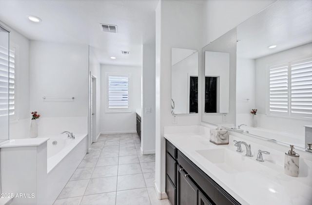 5223 S Axiom, Mesa, AZ 85212 - full bath featuring vanity, a bath, recessed lighting, and baseboards