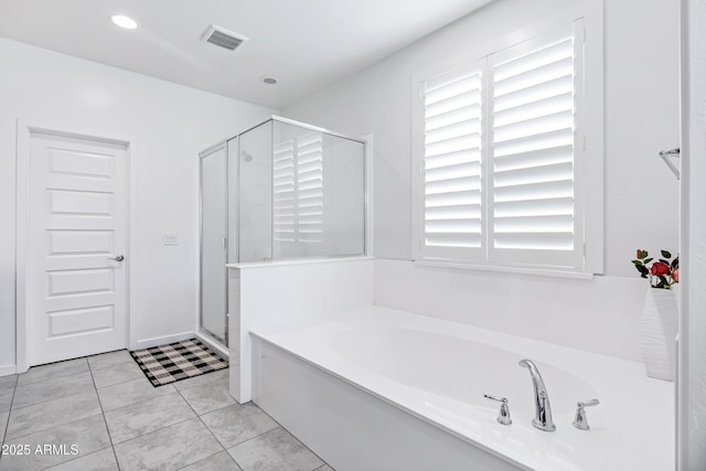 5223 S Axiom, Mesa, AZ 85212 - full bath featuring a bath, healthy amount of natural light, a shower stall, tile patterned flooring, and recessed lighting