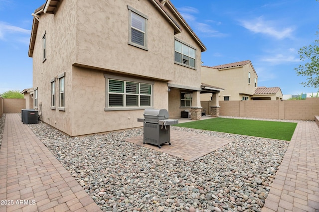 5223 S Axiom, Mesa, AZ 85212 - rear view of house featuring a patio, central air condition unit, and stucco siding