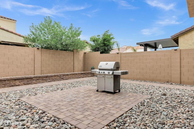 5223 S Axiom, Mesa, AZ 85212 - fenced backyard with grilling area and a patio area