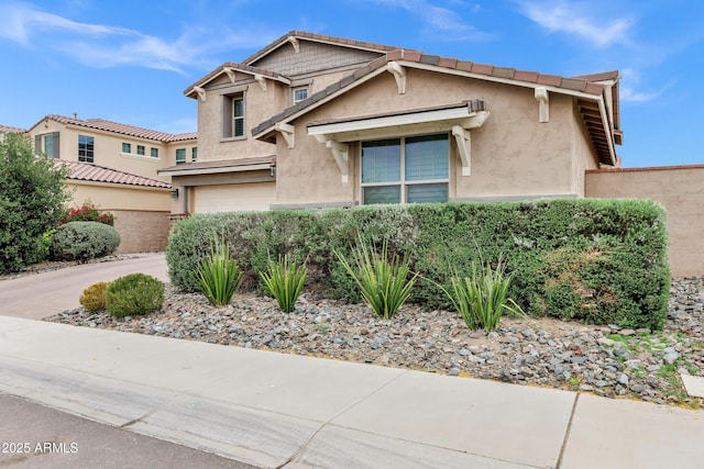 5223 S Axiom, Mesa, AZ 85212 - view of front of home featuring stucco siding and a garage