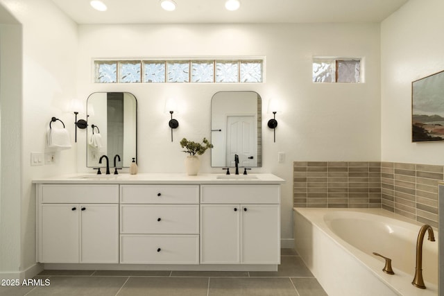 3047 S Chatsworth, Mesa, AZ 85212 - full bathroom with tile patterned floors, double vanity, a bath, recessed lighting, and baseboards