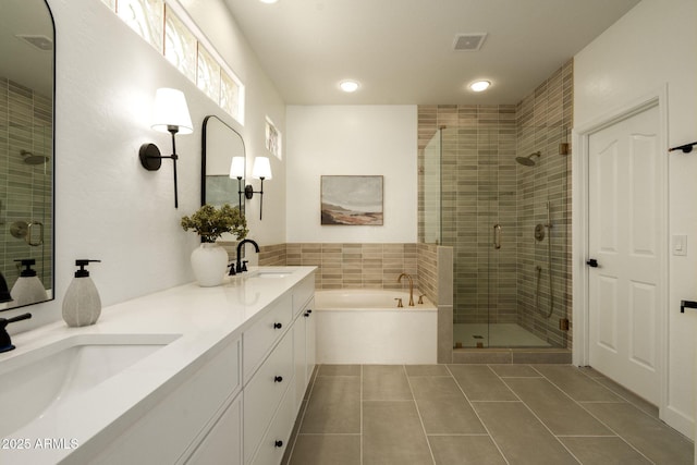 3047 S Chatsworth, Mesa, AZ 85212 - bathroom with tile patterned flooring, a stall shower, a garden tub, double vanity, and recessed lighting