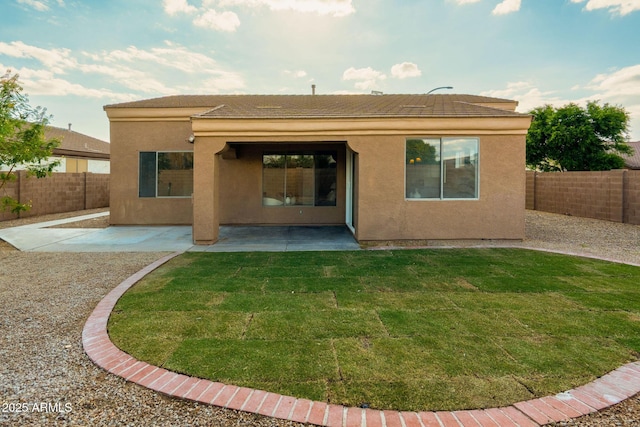 3047 S Chatsworth, Mesa, AZ 85212 - rear view of house featuring stucco siding, a patio area, and a tiled roof
