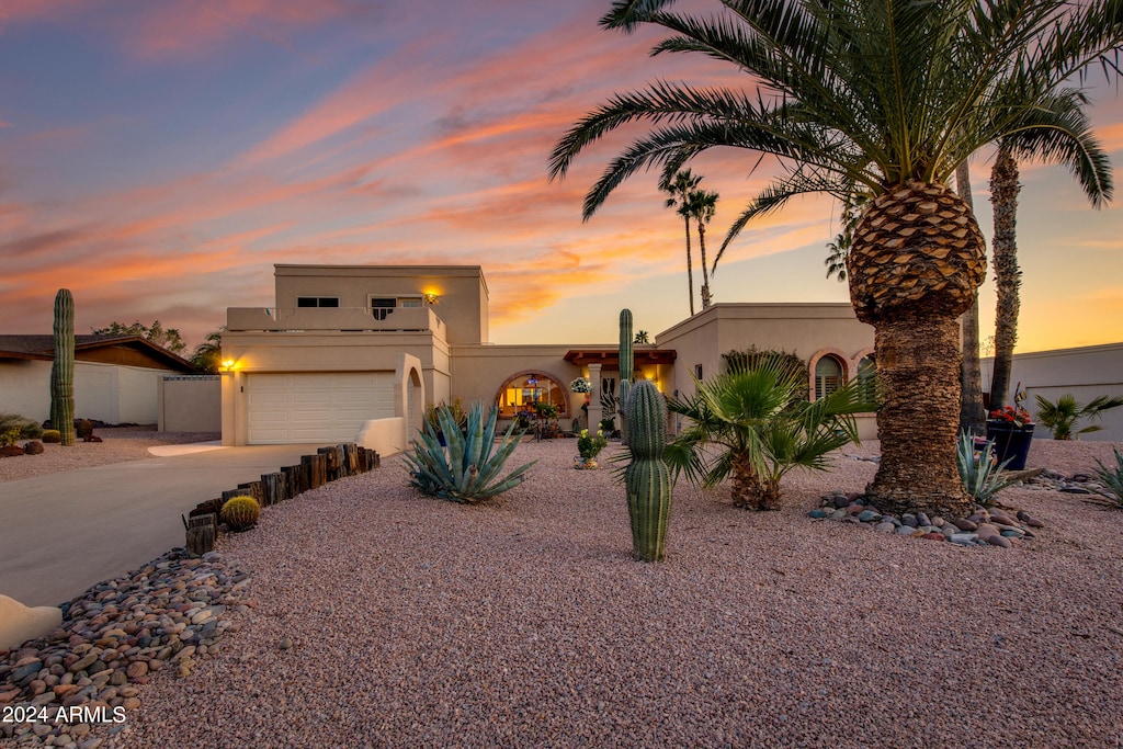 view of front of property with a garage