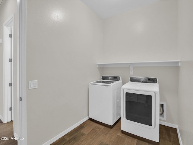 laundry room with separate washer and dryer