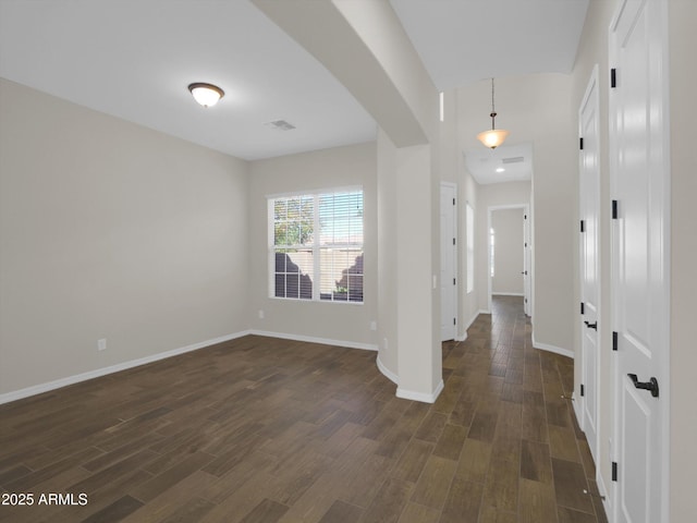 entrance foyer featuring dark wood-type flooring