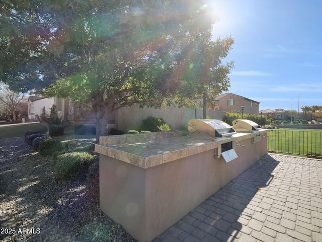 view of patio / terrace featuring area for grilling and grilling area